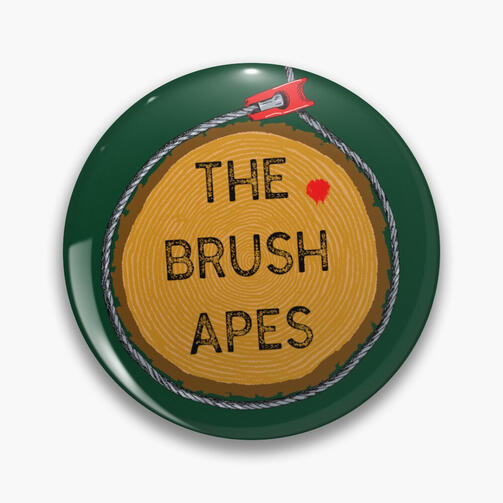 https://the-brush-apes.square.site/ The Brush Apes logo with a green background on a pinback button.